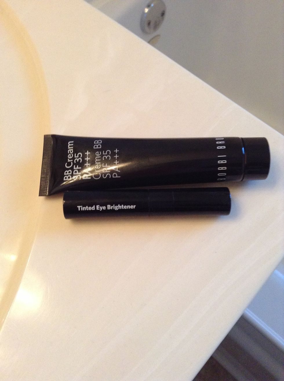 Start with foundation or tinted moisturizer and concealer ...