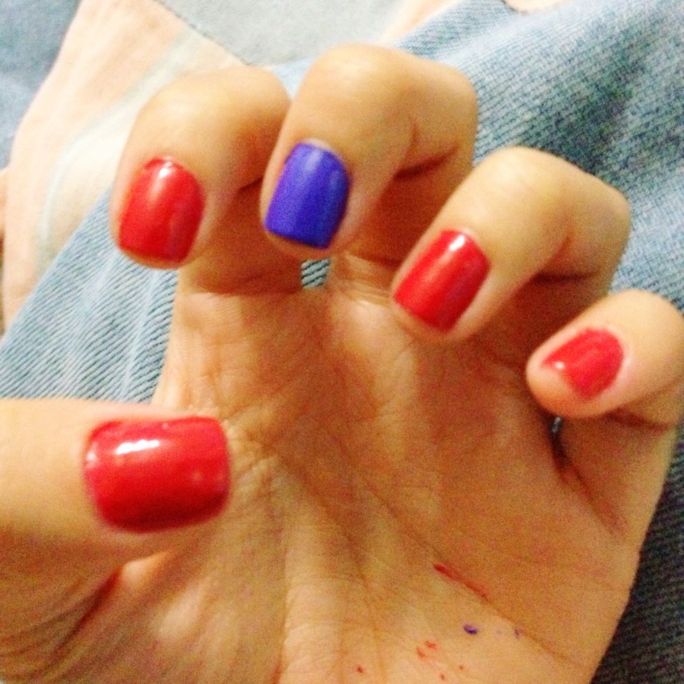 start with painting your nails with whatever color you decide. i highly recommend using lighter colors for the background and darker color for the "spots"