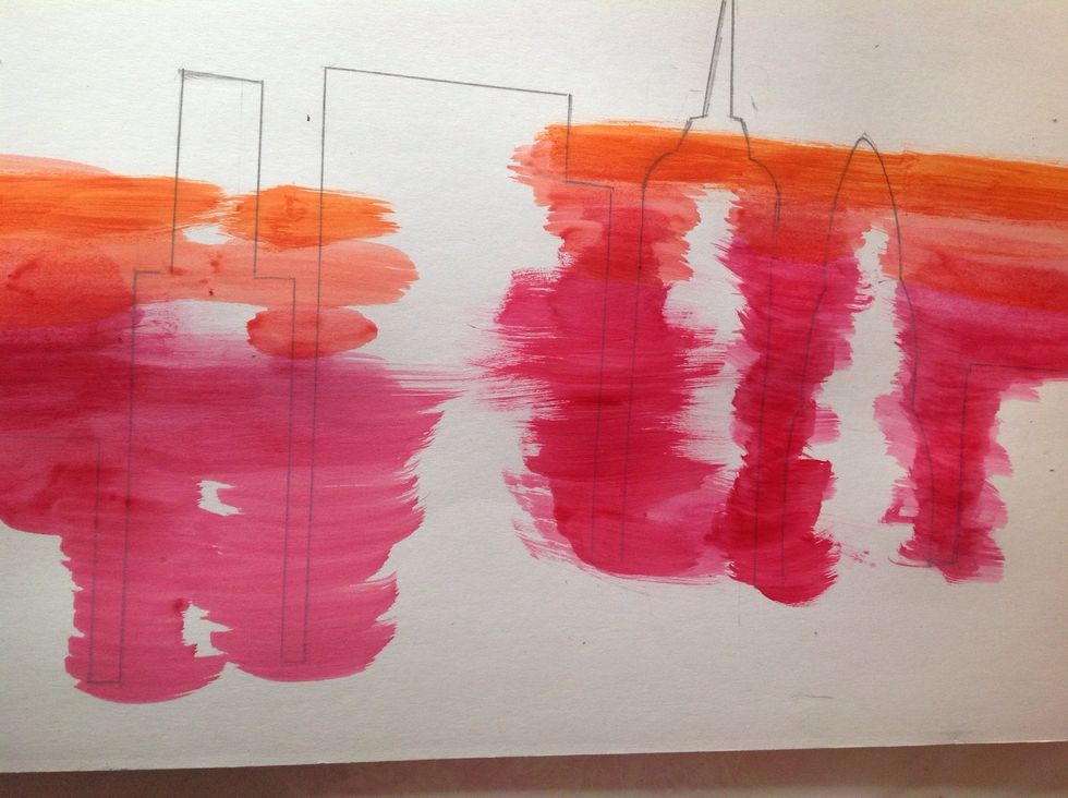 Start with red paint, dont worry about the buildings because you'll be painting them black, which will obviously cover the red. Next, you'll add a lighter shade of red, or you can use orange.