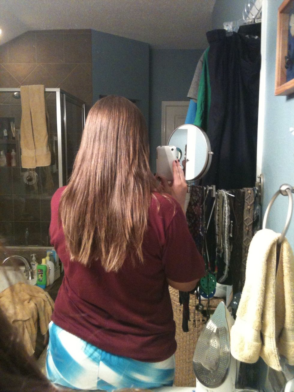 Start with straight hair for the easiest and neatest bow. (sorry it's not completely straight, this was after a day of school)