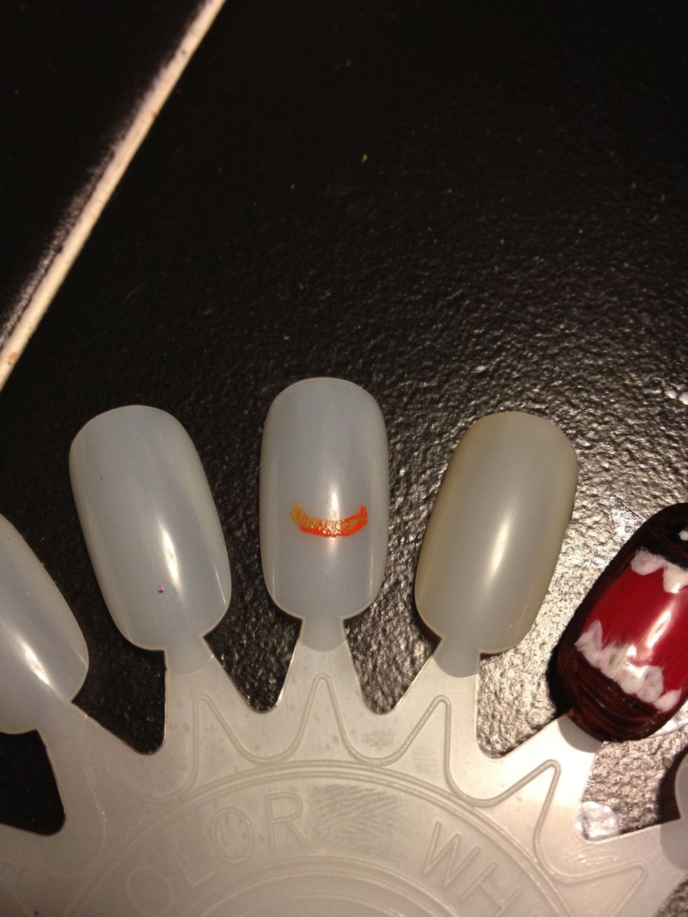 Start with the base of the nose, slightly curved