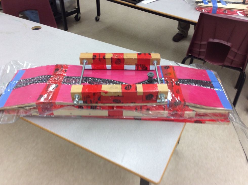 Start with the centre clamp, be sure that it is just the right size to reach both sides of the drop deck. The pump valve should sit in the middle of the clamp.