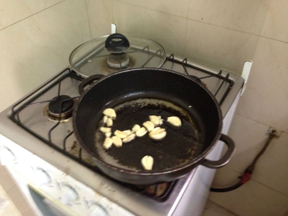 Start with the garlic until it's brown