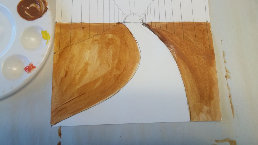 Start with the ground and paint one base color wherever the ground is. Choose what you think best fits an overall base color. For fall I chose a yellow brown (overall color of leaves on the ground).