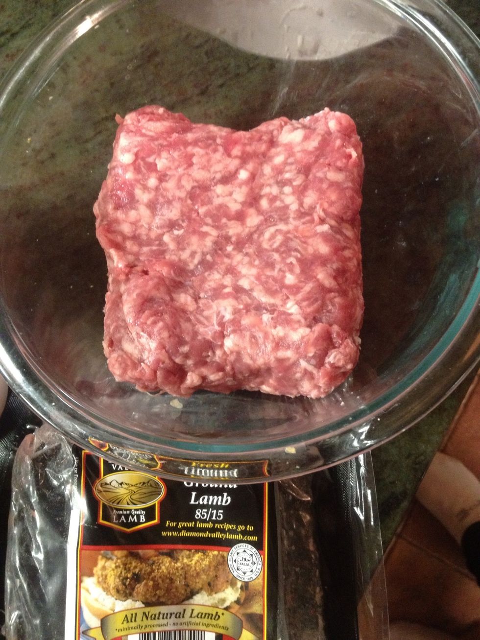 Start with the ground meat in a medium mixing bowl. Grass fed beef, lamb, and bison all make great gourmet burgers.