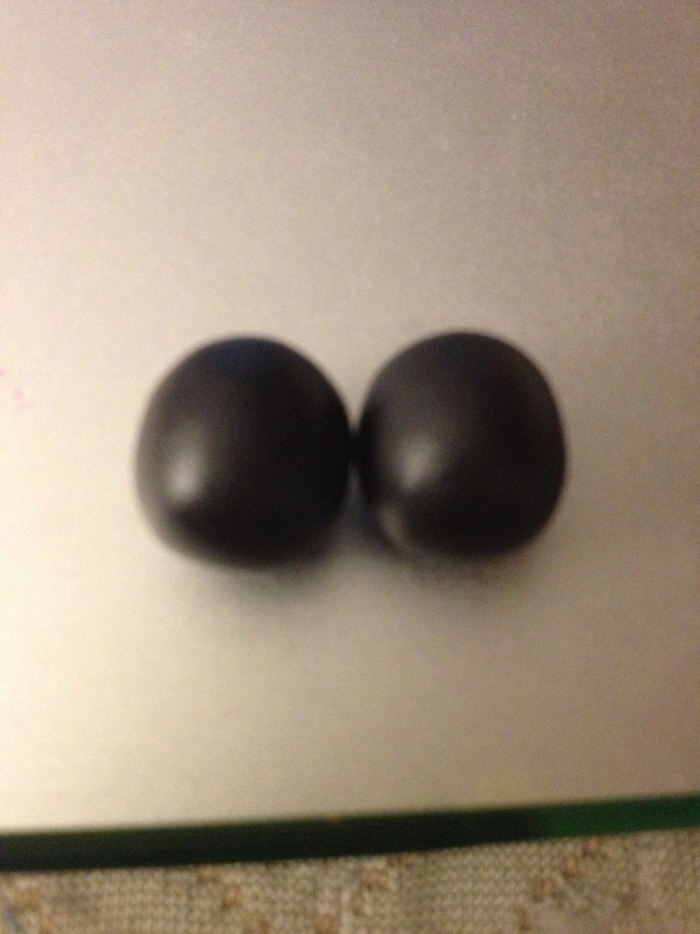 Start with two identically sized balls of clay. Black, or any other color.