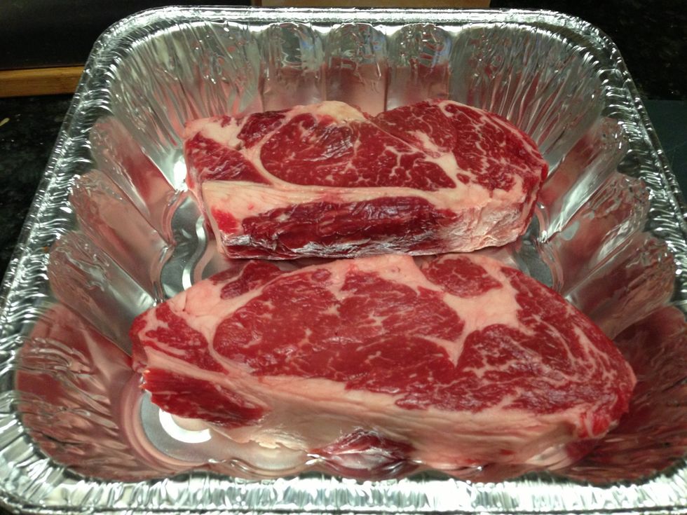 Start with two thick Rib Eye Steaks. Let the steaks rest for at least 30 min outside the fridge. Try to get as much marbling (fat in the steak)  as you can. This is where all the flavor is.