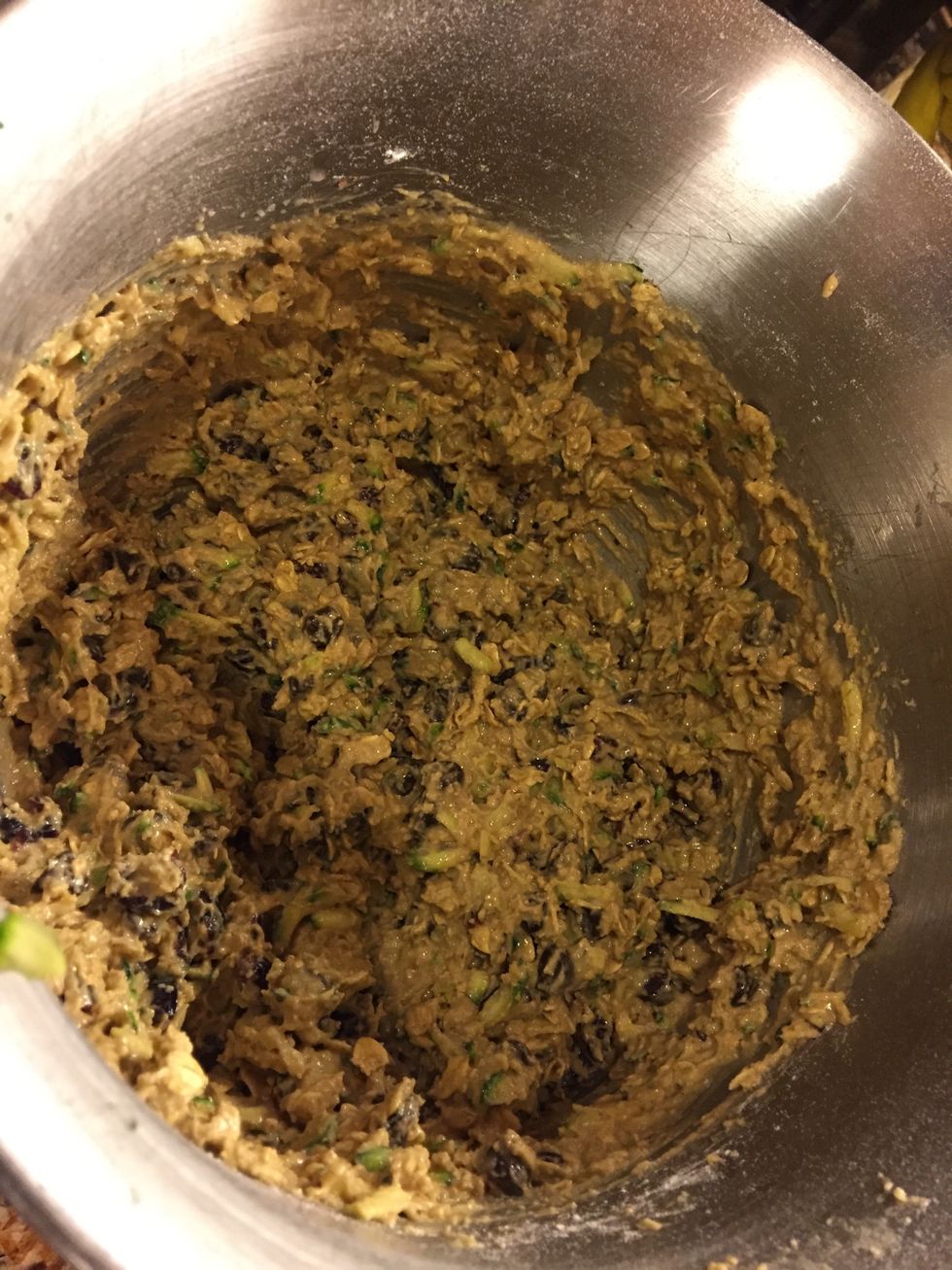 Start with your butter and sugars, cream them together, add egg, then slowly mix in dry ingredients! Add zucchini, chocolate and cranberries!