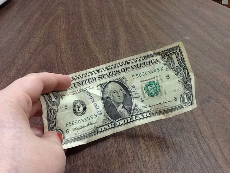 Start with your dollar bill, with General Washington's forever stoic face facing you. Apologize to him for what you are about to do to his face, since his stare is probably making you feel guilty.