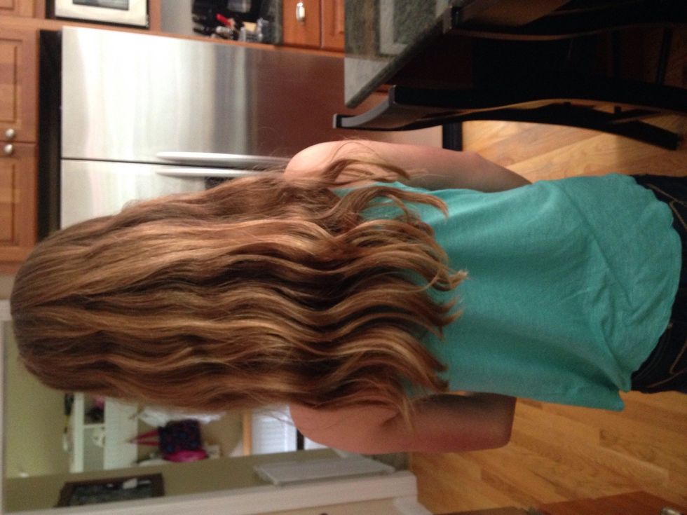 Start with your hair down and brushed through. I added coconut oil spray into my hair to soften it and make it easier to handle.