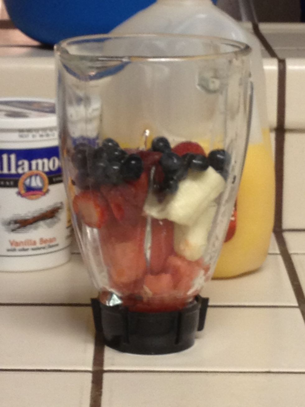 Start with your soft fruit first watermelon, banana, strawberries and blue berries