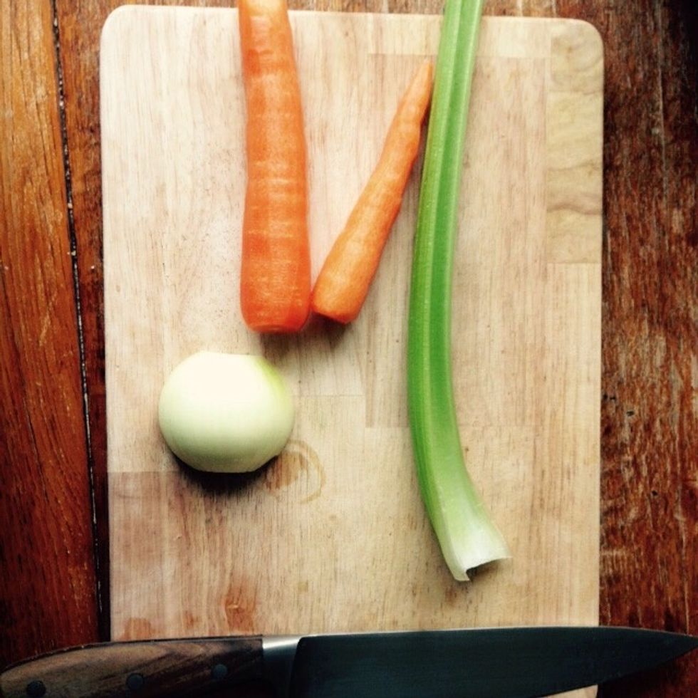 Start working on the vegetables for the soffritto