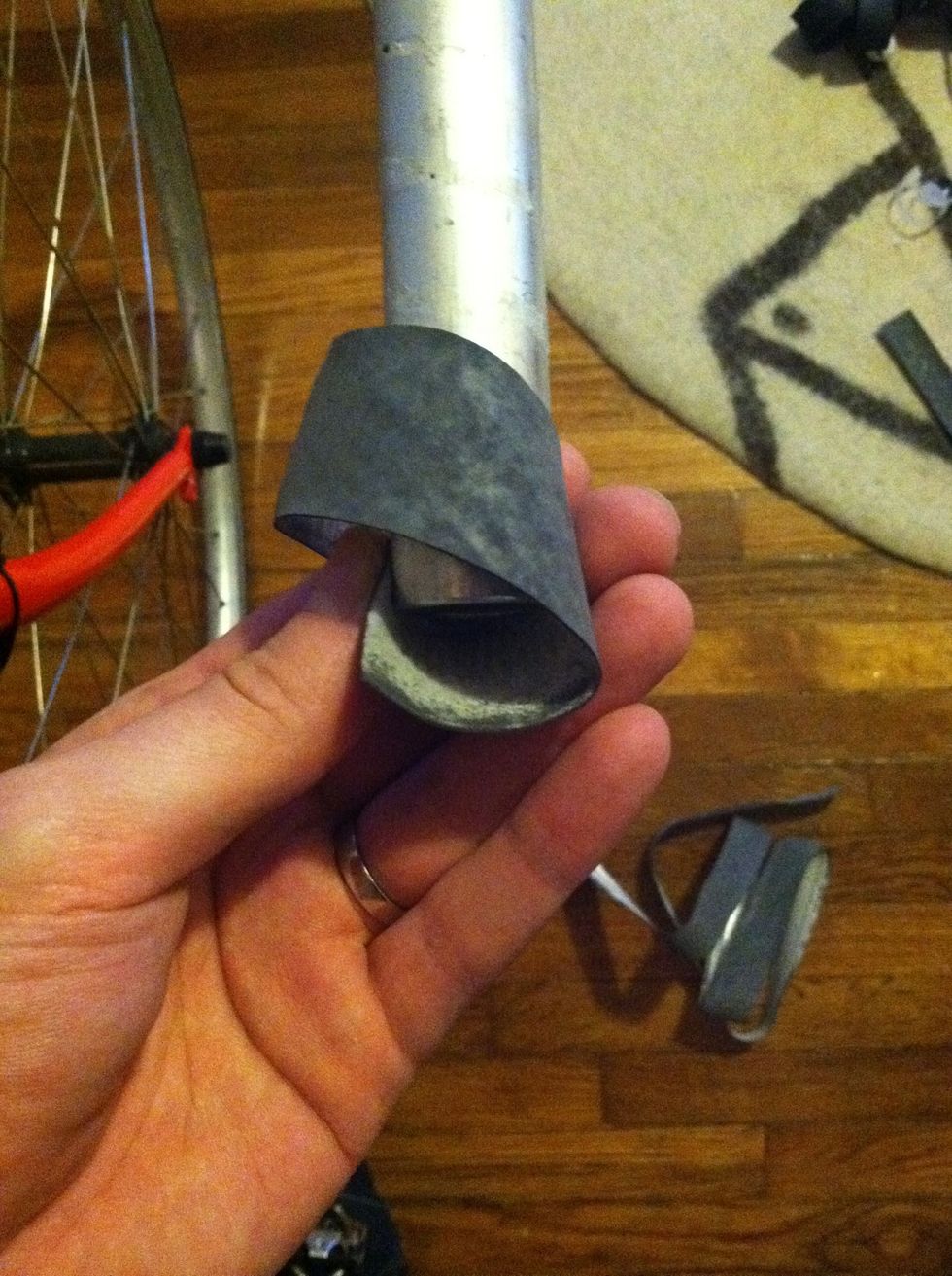 Start wrapping by making a slight cone at the end of the handle.