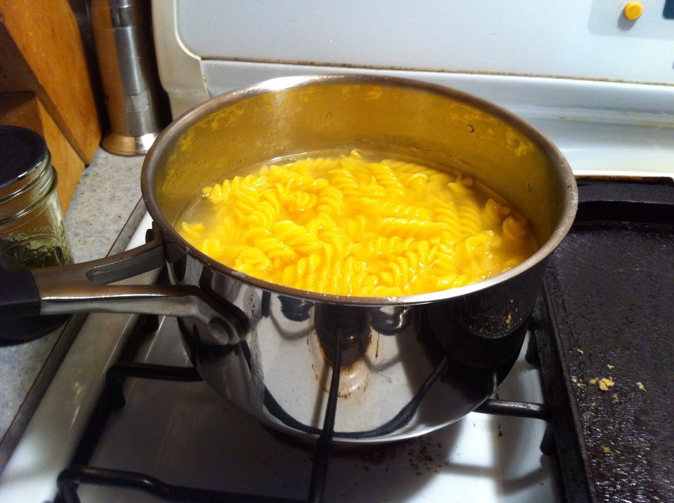 Start your pasta water to boil and follow instructions on bag for boiling as rice and corn pastas vary....