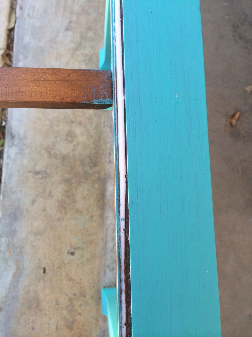 Started to use brush to apply glue, but used finger instead to smooth glue out.