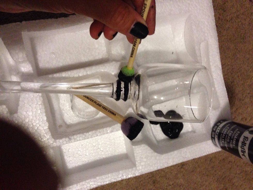 Starting at the base with the smaller sponge applicator