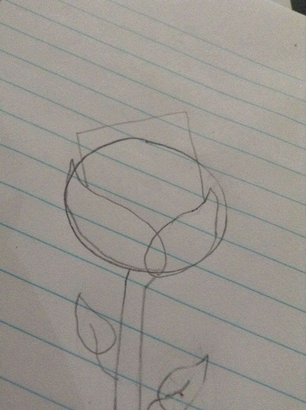 Starting at the curve of the petal, make a rectangle like I did. Erase the circle