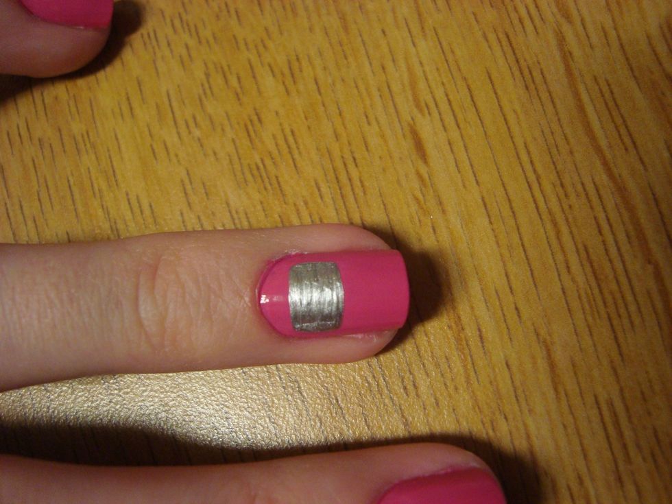Starting at the top of your nail, take your silver striper and make a rectangle.
