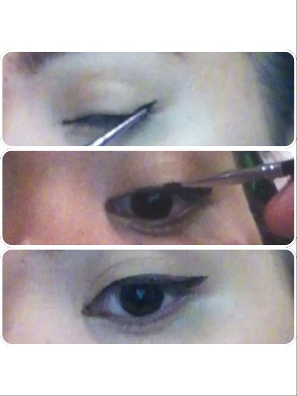 Starting from the outer corner of your eye, create a flick and fill it in going in. Then line your eyes with a technique you are comfortable to use.