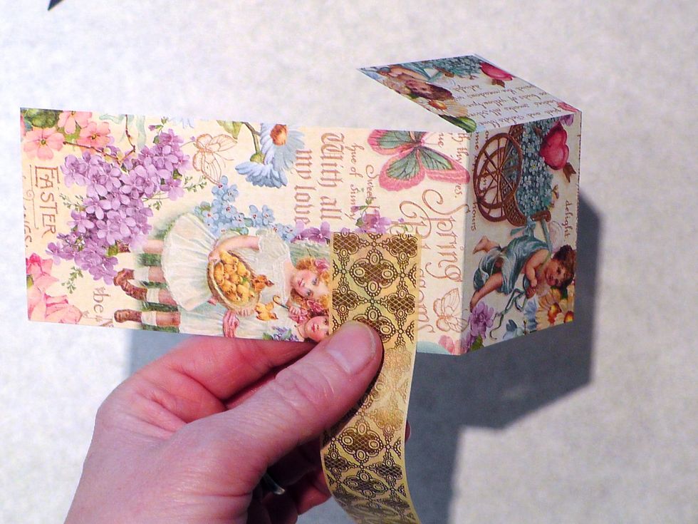 Starting in the back (on the back your image will be upside down) Center the tape and run it around the outside keeping it nice and even