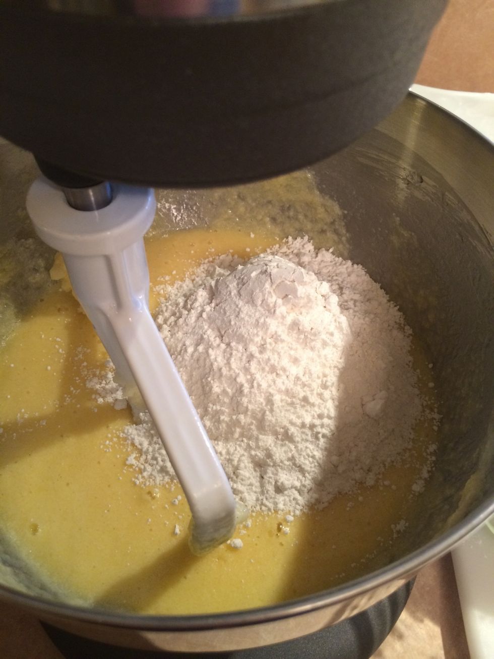 Starting with flour and ending with milk, alternately add each ingredient in 3 additions until fully incorporated. Use a rubber spatula to scrape down the bowl between each addition.