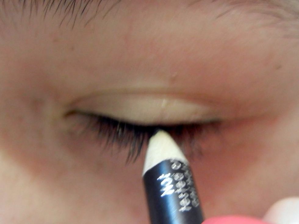 Stay close to the lashes and line using short, smooth strokes. This will take practice! The upper lid is easier to mess up and you'll probably poke yourself in the eye before you get the hang of it.