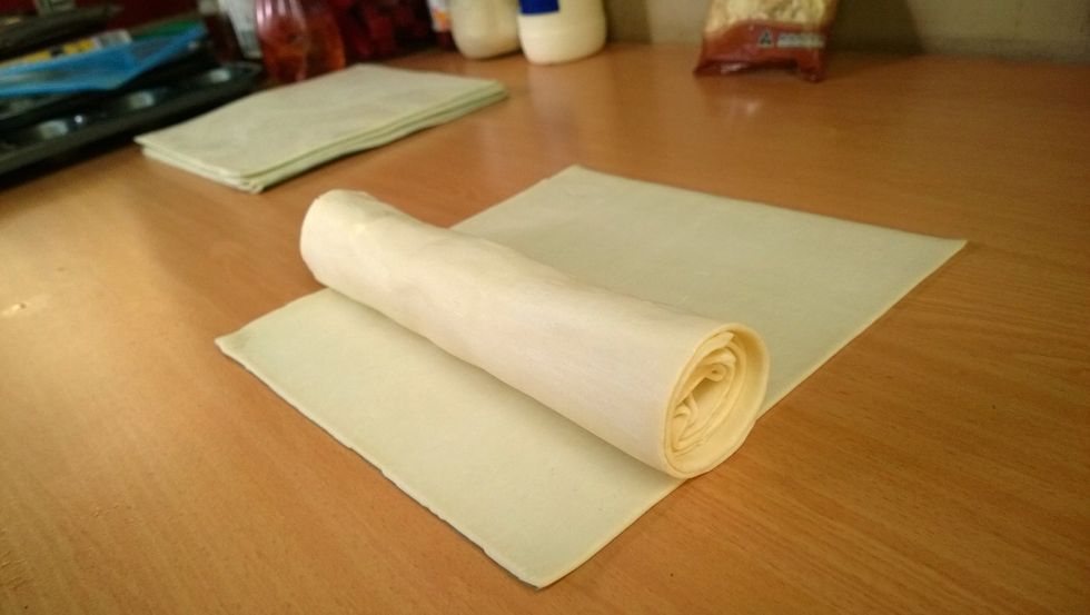 Stay with me now.. Just one more time. 4 sheets all rolled into one. You need 2 pastry logs. Repeat dough steps. Can I get a woot woot!!