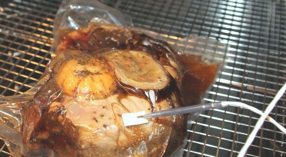 Steam in a combi oven at 185F (85C) for 5 minutes,then place into a 158F (70C). THIII Alto-Shaam cook & hold oven for 42 hours