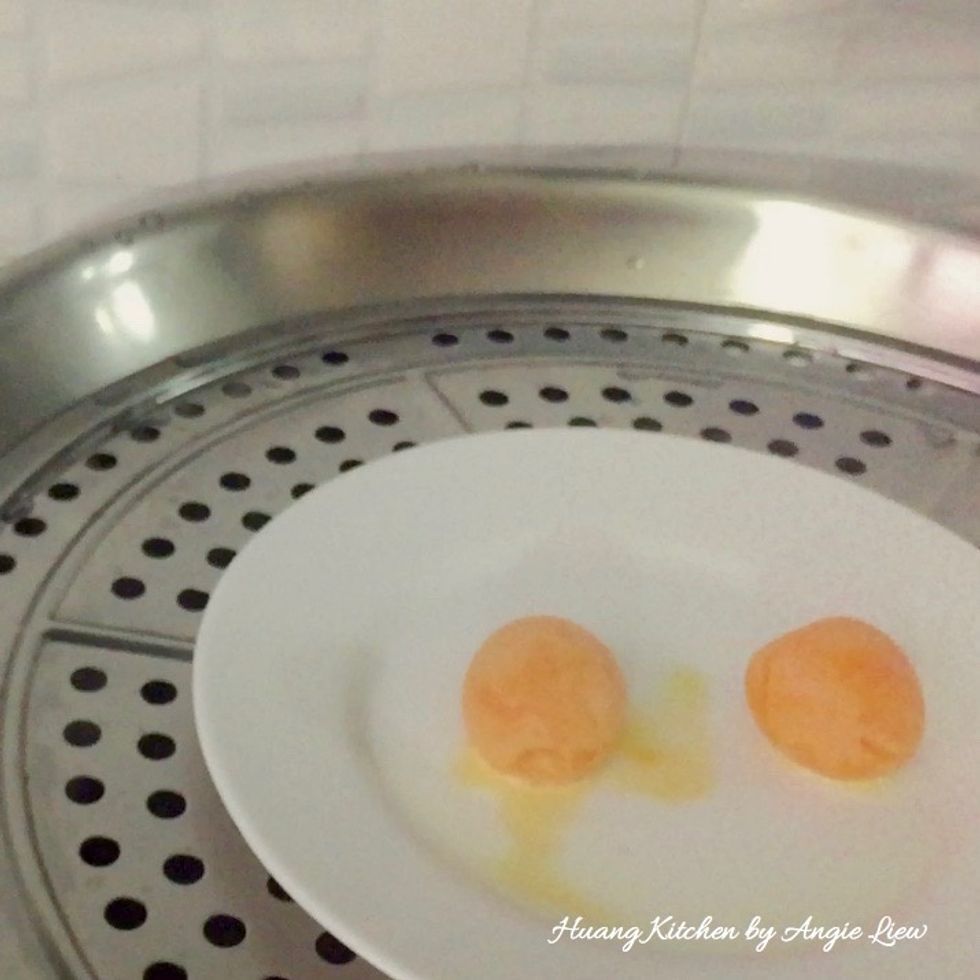Steam the salted egg yolks till cooked, about 7 minutes.