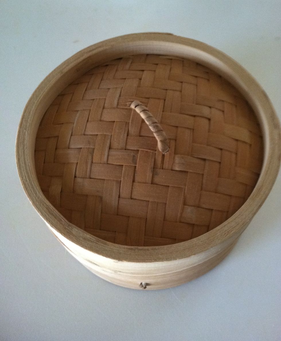 Steamers always have a cover and at least one other section/bowl.  They can be multi-tiered for preparing different items at the same time.