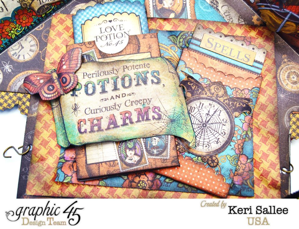 Steampunk Spells Tags and Pockets made easy work of this side. Simply layer 2 contrasting paper mats down and then layer pockets, stickers and fussy cut images on top.