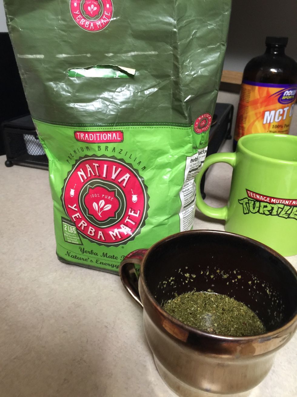 Steep the Yerba Mate Tea for 2 minutes. U can filter out the tea leaves if u want, but I left mine in. Add to the melted soap and stir. (Gotta respect the TMNT coffee cup in the background)