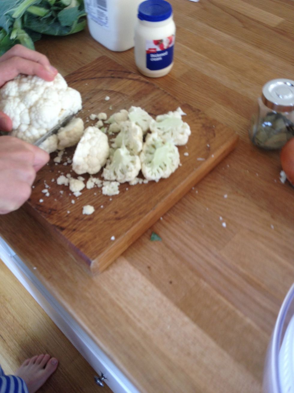 Step 1. Chop the cauliflower into small florets and getting rid of the leaves.