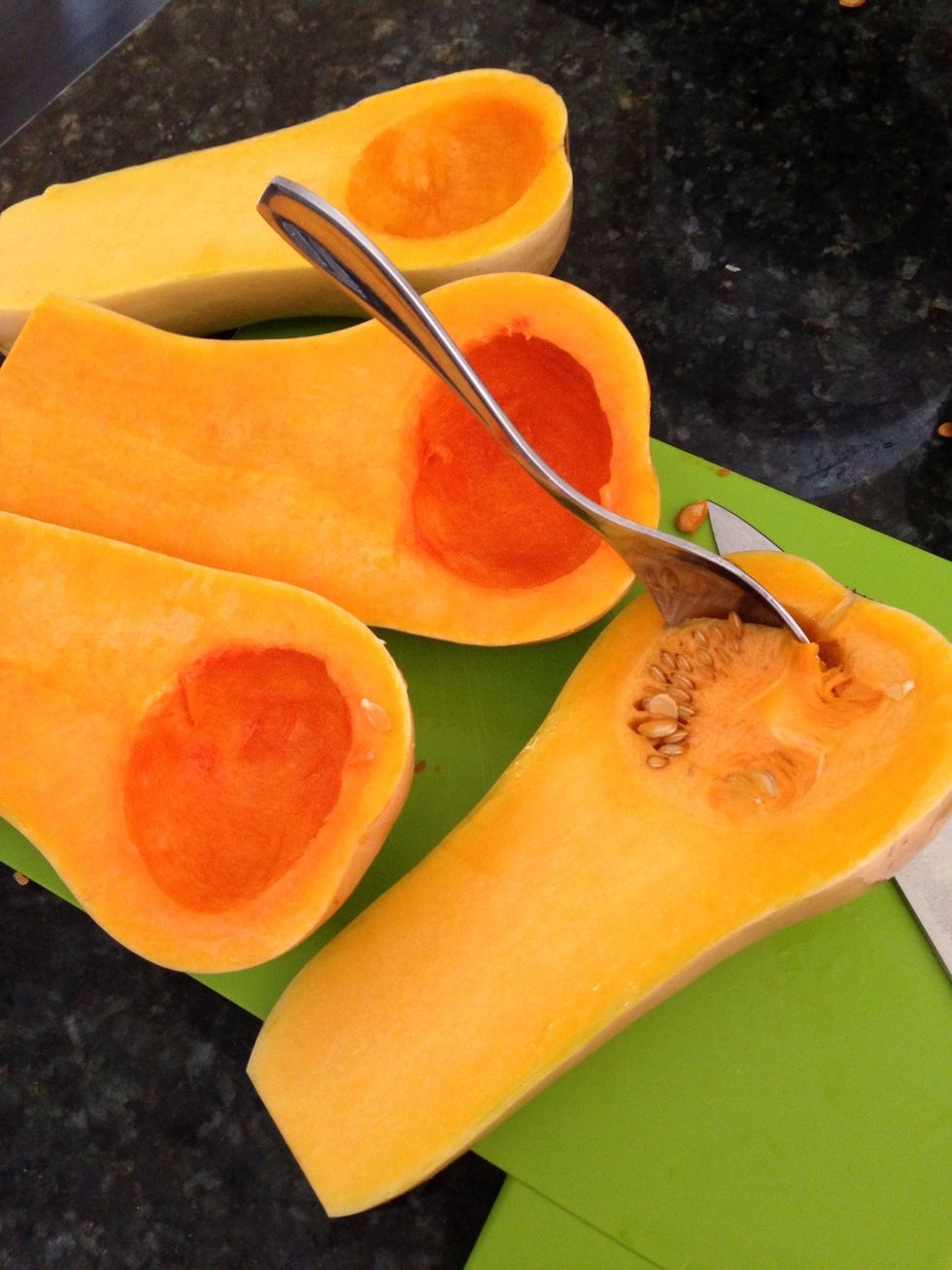 Step 1: Cut the butternut squash lengthwise and scoop out the seeds (shown above). Preheat the oven to 400 degrees.