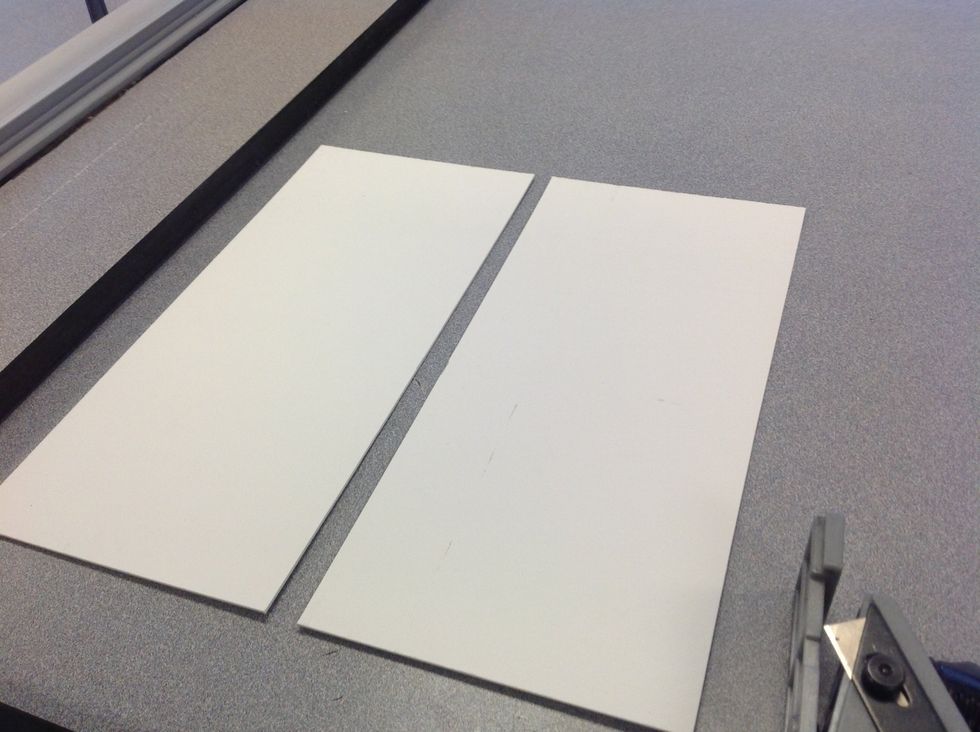 Step 1: Cut two pieces of mat board into identical pieces. They should match up when stacked one on top of the other.
