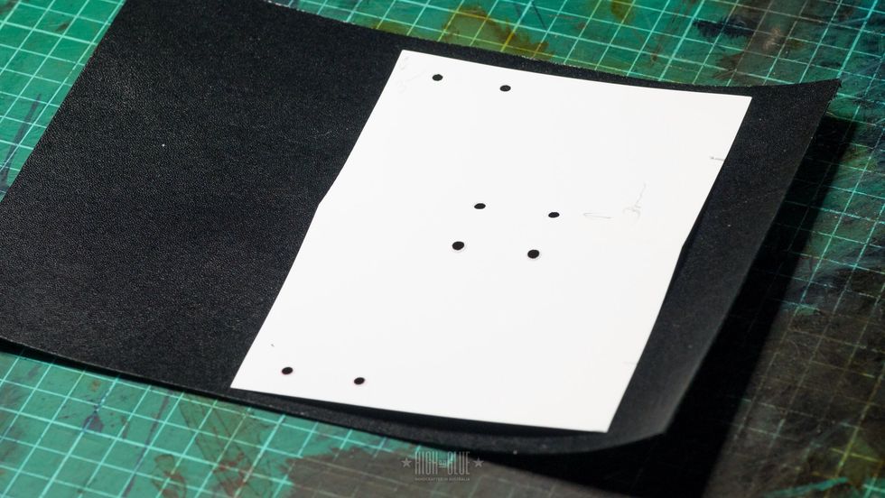 Step 1: gather material - Get a piece of leather that\u2019s big enough to fit the template on it. Get template from http://highonglue.com/how-to-make-a-small-leather-credit-card-wallet/