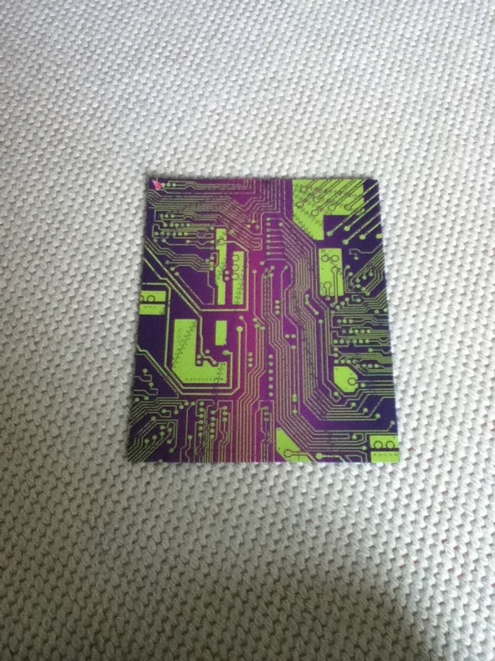 Step 1: Get a piece of paper. My piece has a jazzy pattern on it so it will look cool when it is finished but you dont have to do it\ue415