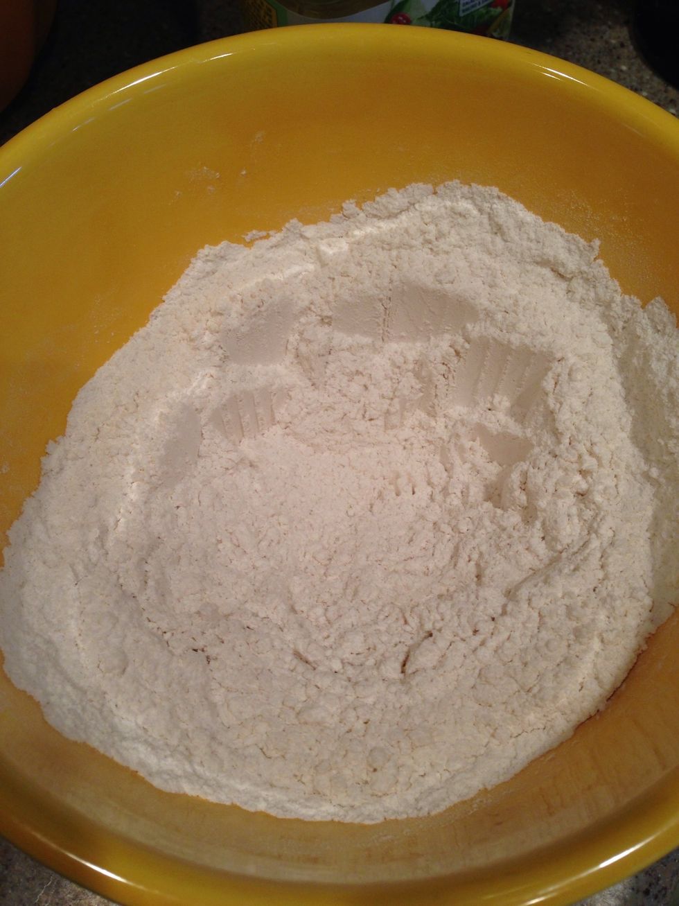 Step 1: In a bowl stir together flour, sugar and salt.