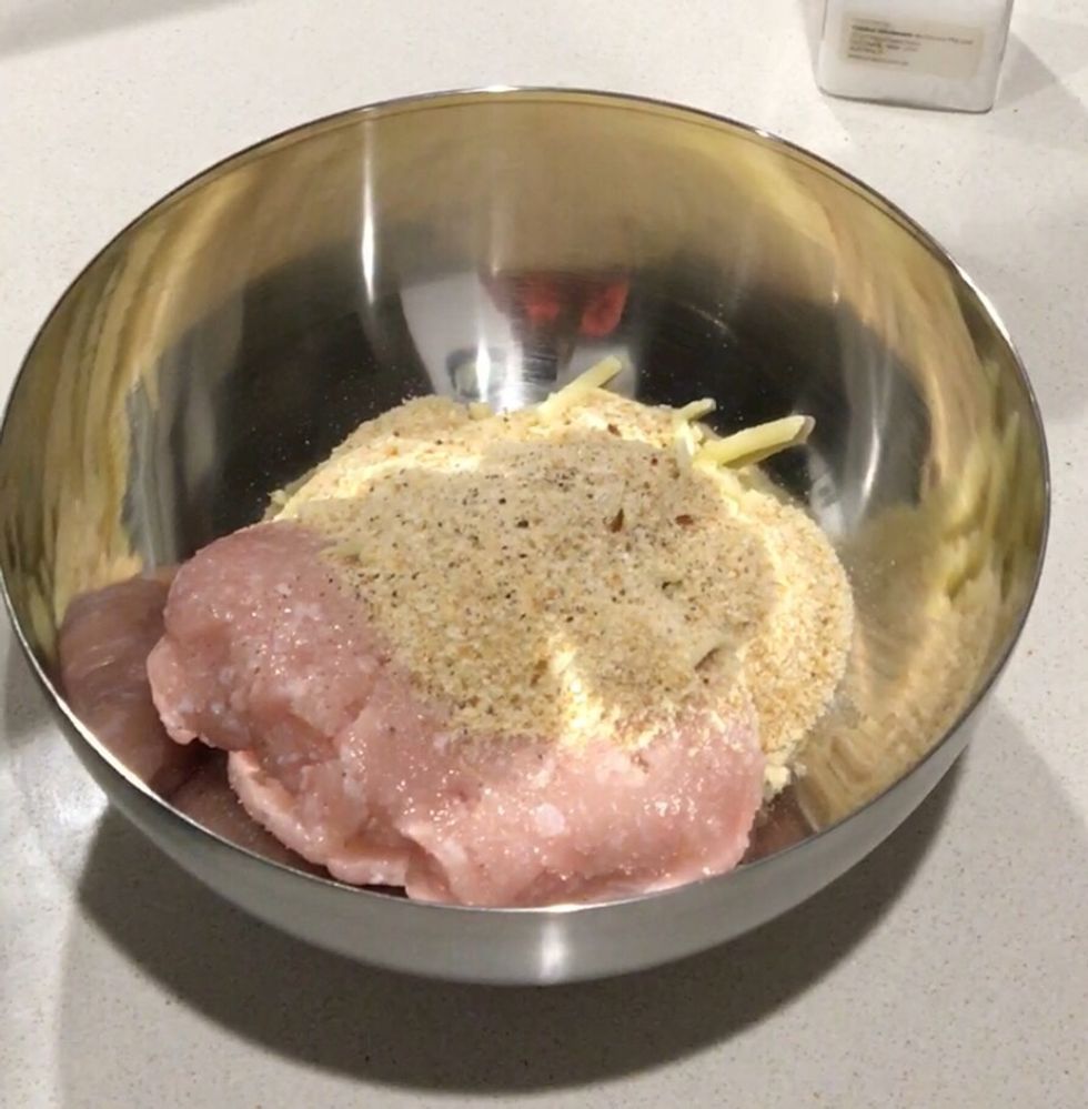 Step 1: Place mince, breadcrumbs, cheese and onion in a medium bowl. Season with salt and pepper. Then mix them together.