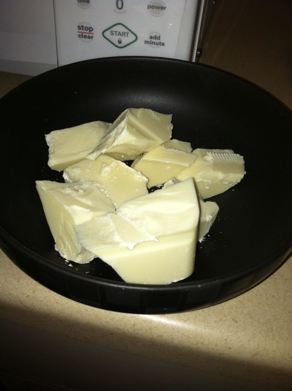 Step 1: Place the white chocolate chips in the microwave in a microwave safe bowl. (You can use a chocolate melter too.) Melt in the microwave for 30 seconds.