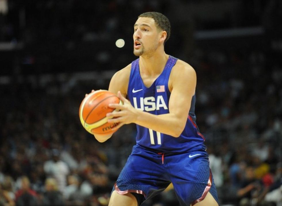 Step:1 Place your feet shoulder width apart. Bend your knees so  you get more power in your shot.