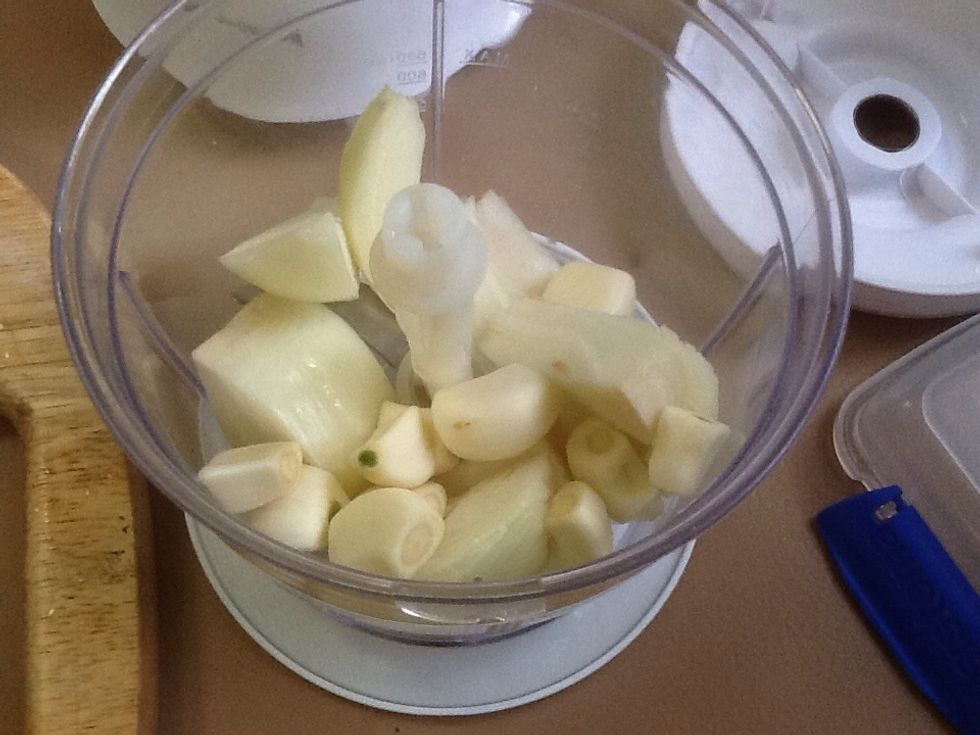 Step 1: Puree the onion and garlic.