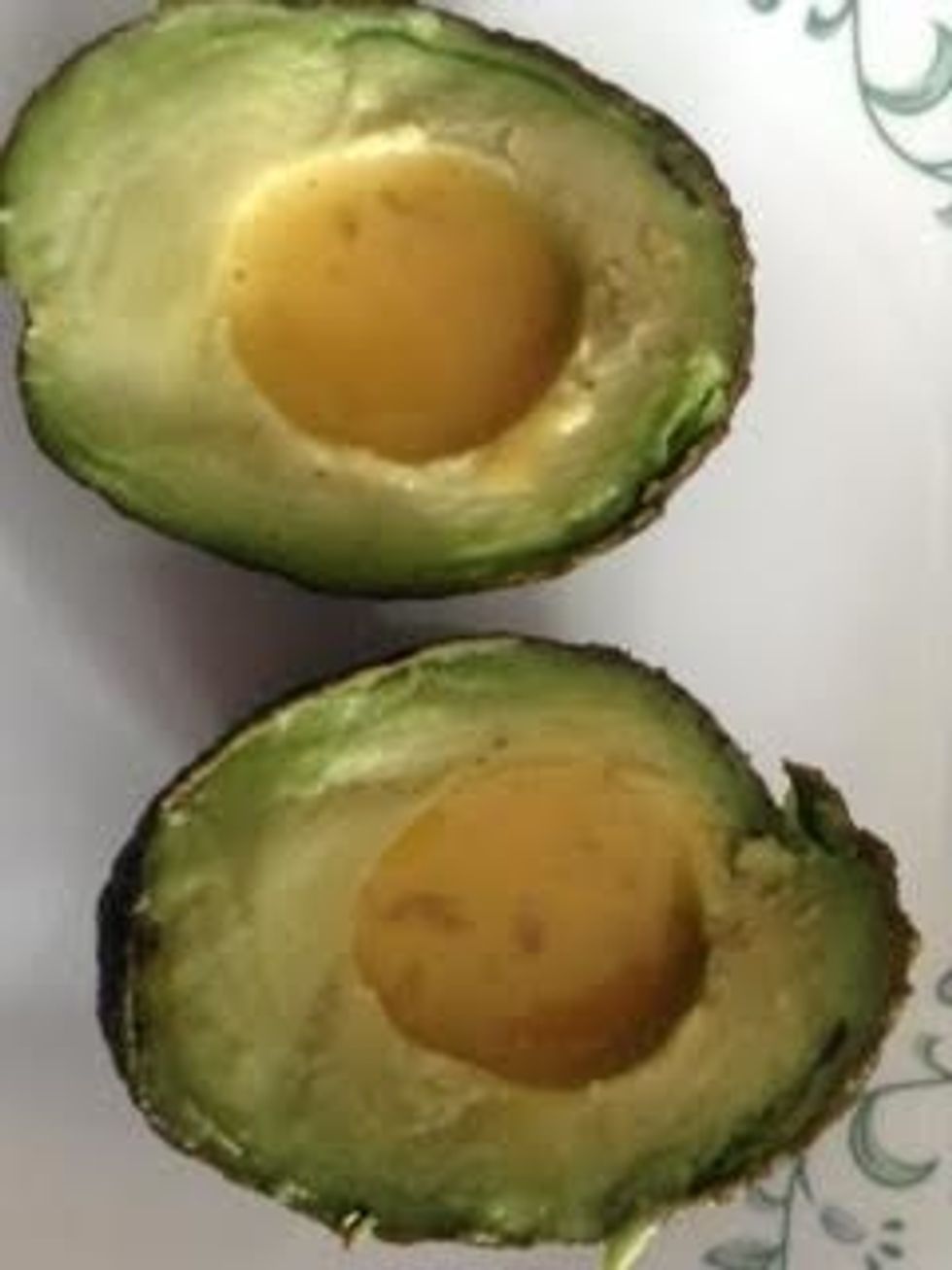 Step 1- Put smashed egg into the Avocado.