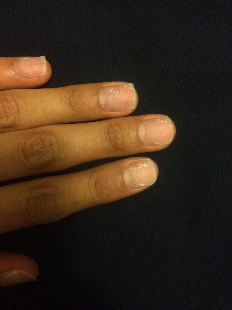Step 1:Trim and file your nails to your desired length and shape. Wash your hands, make sure your nails are completely dry!!!!! Sorry for my nail's appearance, I had acrylics for a month and a half :(