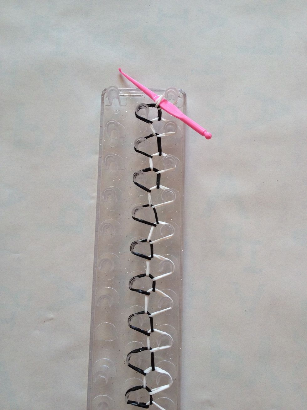 Step 10: now put your hook through the last band you have just looped