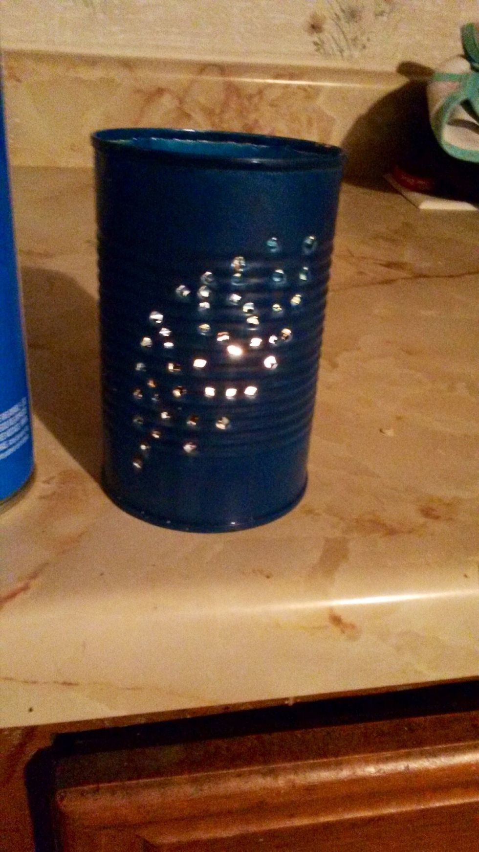 Step 10: Place a candle inside your can & light it to show off your beautiful design.