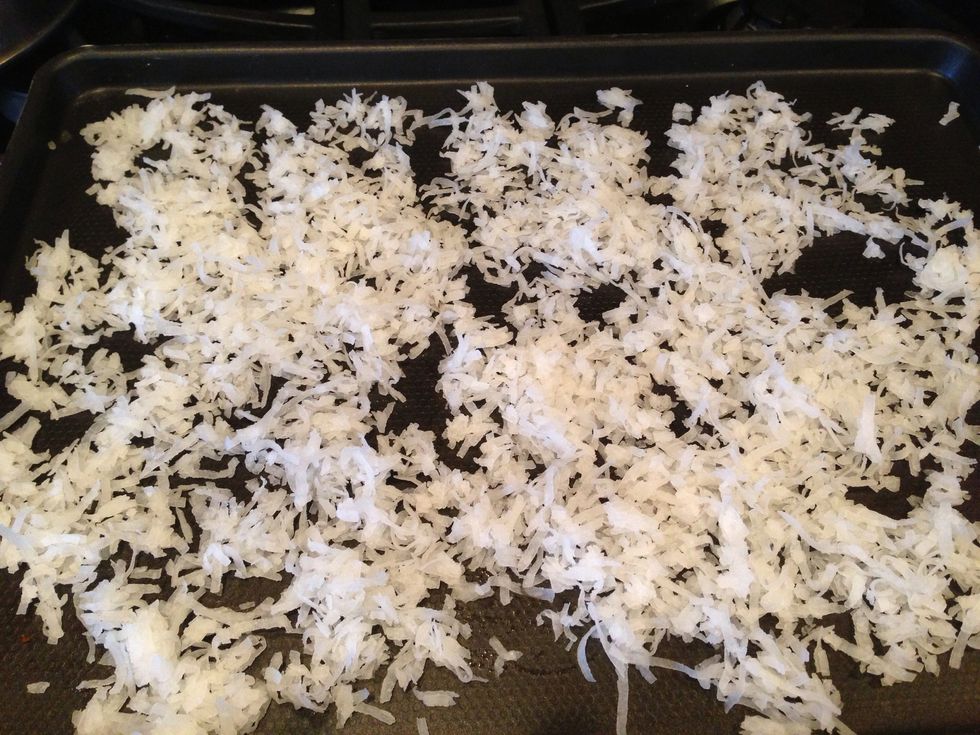 Step 10: spread coconut on a baking pan and put in oven for 3 min. Pull out and mix coconut around on the pan and then return to the oven for 3 more min.