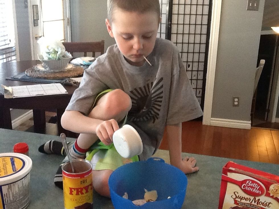Step 11. Add 1/2 cup of cocoa powder.