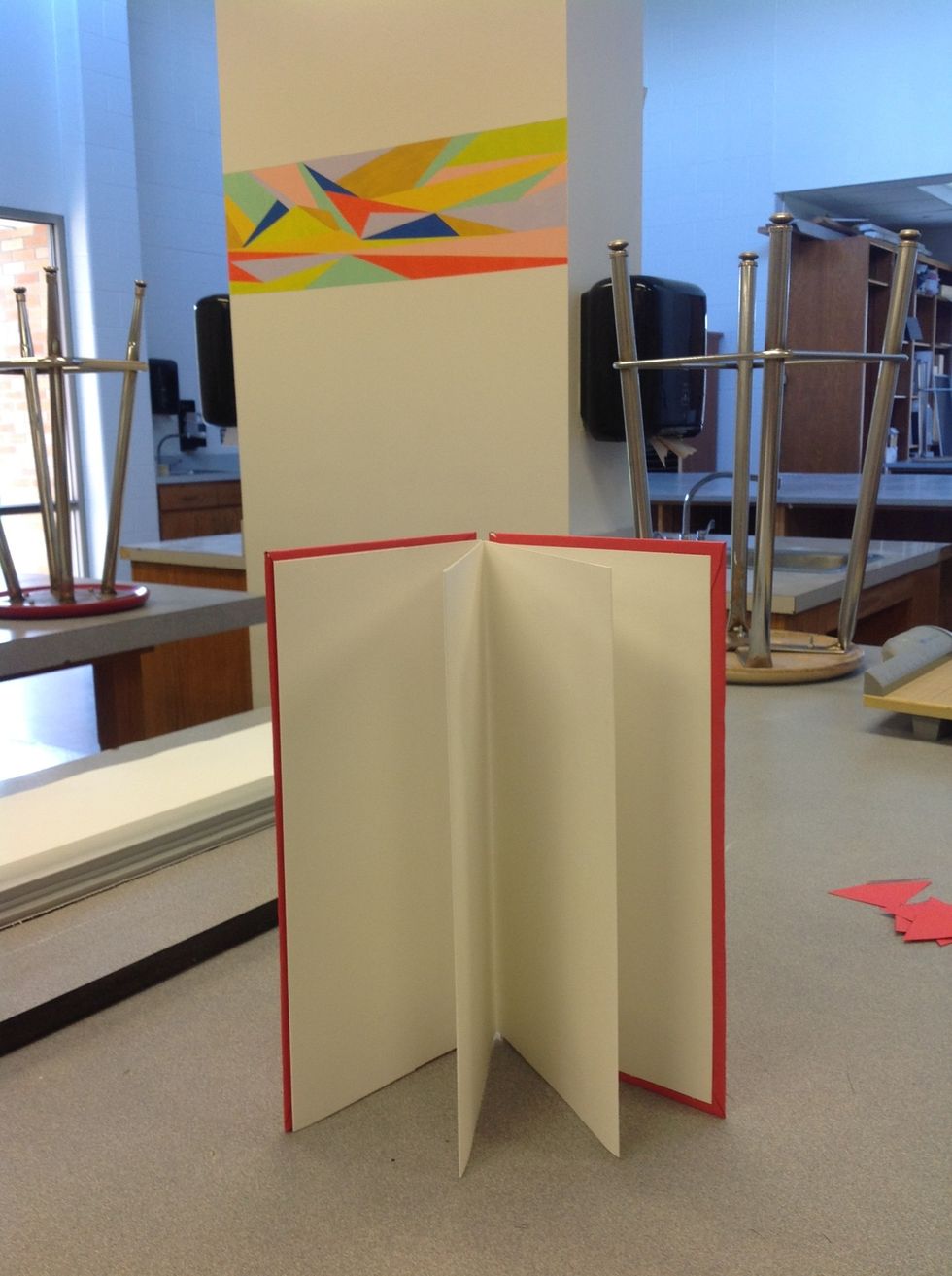 Step 11: Glue the last accordion fold to the outside cover of your book. Voila!