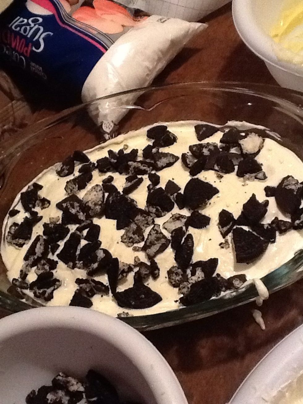 Step 14- add another layer of crushed Oreos to cream cheese mixture.